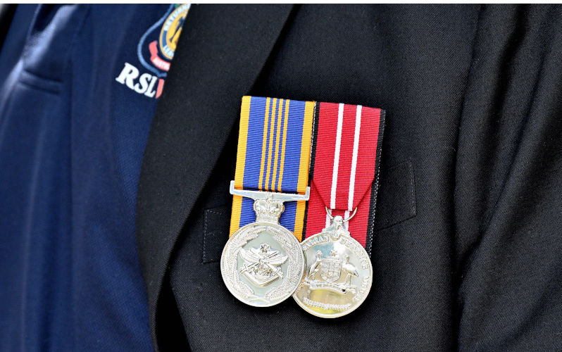 A closeup of two Anzac medals pinned on the jacket of an RSL member. Image: Alamy Contributor: Wirestock, Inc. Image ID:2JJTW4H RSL tries to tackle its troubles