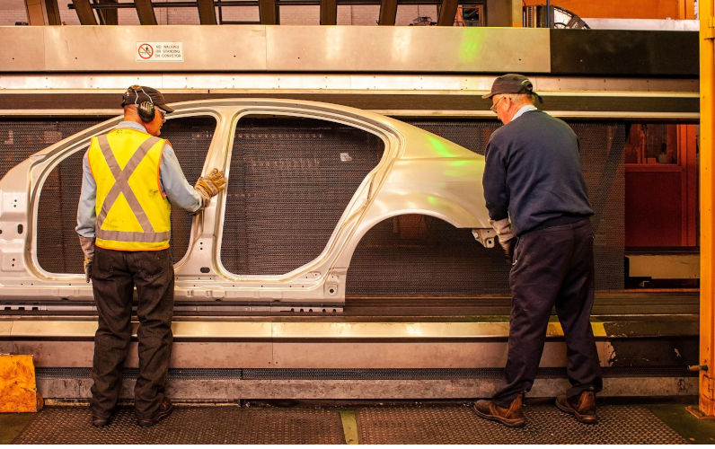 Men working on the production line at the GMH plant in Elizabeth, South Australia. Manufacturing at GMH ceased in 2017. Image Alamy. ContributorRob Walls. Image ID2JMNNB2 From proletariat to boxetariat: The new working class