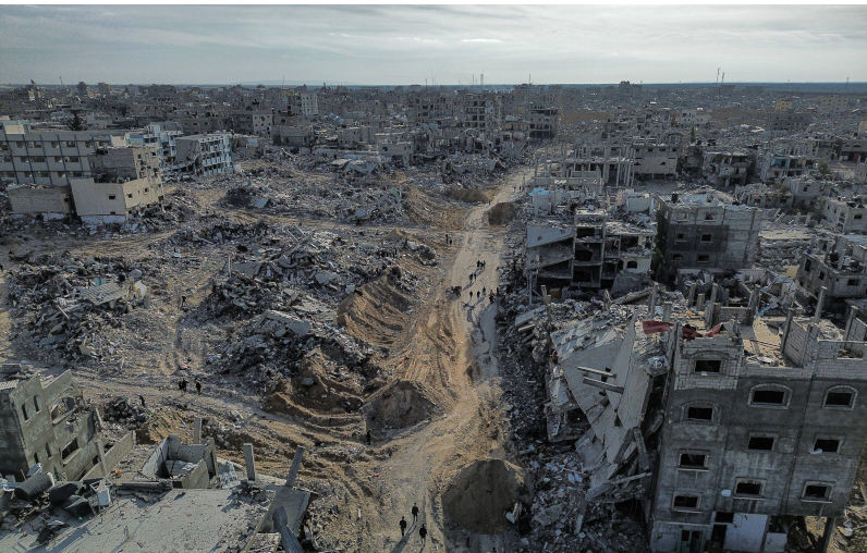 An aerial view taken with a drone shows internally displaced Palestinians walking along a street among the rubble of destroyed buildings amid a ceasefire between Israel and Hamas, in Rafah An aerial view taken with a drone shows internally displaced Palestinians walking along a street among the rubble of destroyed buildings amid a ceasefire between Israel and Hamas, in Rafah, southern Gaza Strip, 19 January 2025. Israel and Hamas agreed on a hostage release deal and a Gaza ceasefire to be implemented on 19 January 2025. Photo by Omar Ashtawy apaimages Rafah Gaza Strip Palestinian Territory 190. Image Alamy. ContributorImago. Image ID2S7RFNB As Gaza starts to rebuild, what lessons can be learned from Nagasaki in 1945?