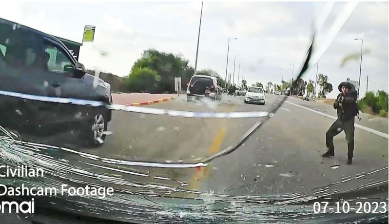 HAMAS attack on Israeli settlement 7 October 2023. Car dashcam photo of a Hamas gunman. Image Alamy. ContributorPictorial Press Ltd. Image ID2T9H81H 7 October 2023: What really happened? Part 1