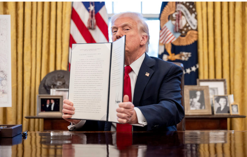 Washington, United States. 26 March, 2025. U.S President Donald Trump, holds up a a signed executive order applying tariffs to all auto imports during a signing ceremony at the Oval Office of the White House, March 26, 2025 in Washington, D.C. Credit: Molly Riley/White House Photo/Alamy Live News. Contributor: White House Photo / Alamy Stock Photo Image ID: 3AA7XRC Tariff deadline extended as Trump’s trade talks falter