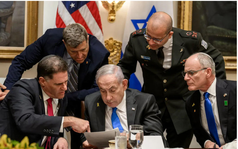 Israeli Prime Minister Benjamin Netanyahu reviews documents with advisors and security officials during a White House meeting in Washington, D.C. before their joint press conference announcing on the U.S. peace plan for Gaza, titled ?Pathways to Peace Gaza 2030. September 2025. Image courtesy of the White House. Image Alamy. ContributorBlueee. Image ID3CRJA1P Jeffrey Sachs: Twenty-point plan minus the US-UK colonialism