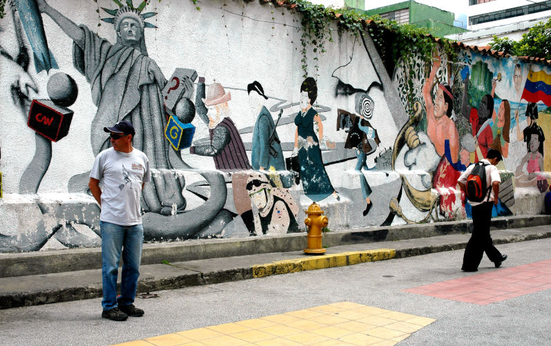 In Merida, a Venezuela university city, a mural shows a Statue of Liberty as well as local references. Image Alamy. ContributorMarion Kaplan. Image IDA4NXJE Trump CIA intervention in Venezuela risks another US war of choice, experts warn
