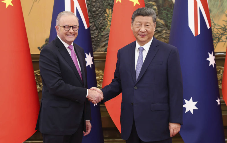 In this photo released by Xinhua News Agency, Chinese President Xi Jinping, right, shakes hands with visiting Australian Prime Minister Anthony Albanese prior to their bilateral meeting at the Great Hall of the People, in Beijing, China, Tuesday, July 15, 2025. Image:AAP/Huang Jingwen/Xinhua via AP Albanese can afford to ignore noises and focus on delivering goods for voters