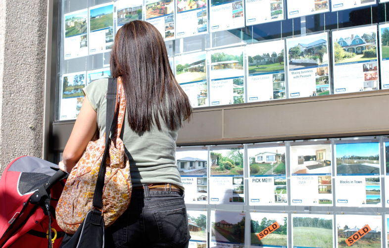 Young Mum Home buyer browsing real estate agent window. Location is Devonport, Tasmania, Australia. Image Alamy. ContributorAlex Hinds. Image IDBGT7A6 As the home ownership dream fades, Australians may be open to a frank conversation about house prices