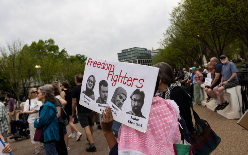 Washington Dc, USA. 19th Apr, 2025. A demonstrator in the anti-Trump protest holds a sign on April 19, 2025, in front of the White House, Washington, DC. Besides the national capital, demonstrators also gather in other major cities across the country. (Photo by Aashish Kiphayet/Sipa USA) Credit: Sipa USA/Alamy Live News Contributor: Sipa USA / Alamy Stock Photo Image ID: 3AWEY8B Judge orders release of Georgetown scholar Badar Khan Suri from ICE detention
