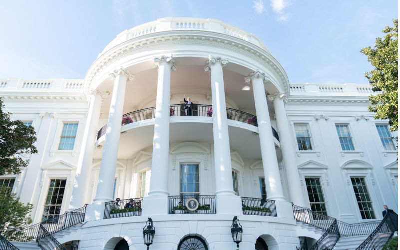On April 22, 2019, President Donald J. Trump waved from the White House balcony during the 141st White House Easter Egg Roll, an annual event on the South Lawn with guests of all ages participating in egg rolling activities. Contributor: 2020 Images / Alamy Stock Photo Image ID: 2BKCY1D Trump is the symptom of a deeper American malaise