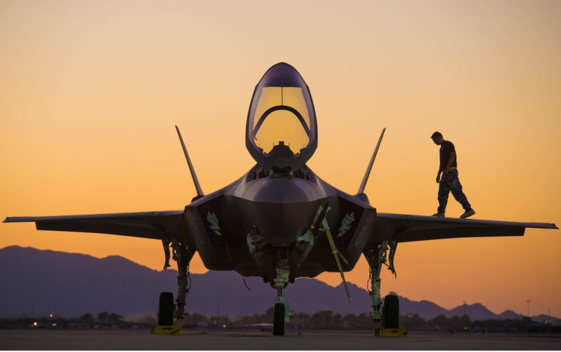 A Royal Australian Air Force Airman walks on the wing of an F-35A Lightning II at Luke Air Force Base, Ariz. Image: Alamy. Contributor: Barney Low Image ID: PKF810 What about the RAAF in the AUKUS equation