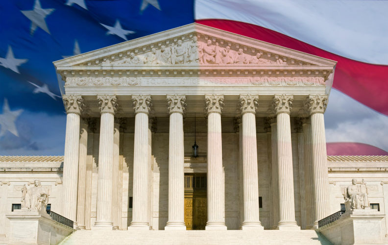 The front of the US Supreme Court in Washington, DC, montaged with the current US flag. Image Alamy. ContributorBlakeley. Image IDGJEKMG A Supreme Court showdown looms for Trump’s tariffs. Will it limit presidential power?