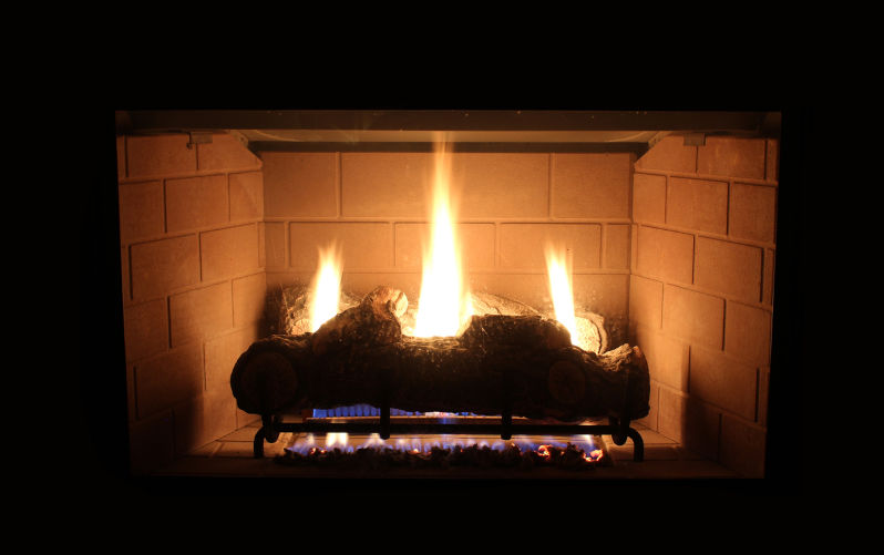 Gas Fireplace. Image: iStock / cpaulfell Decommissioning rates show gas heating could be gone by 2032, but oil exec bonuses might suffer