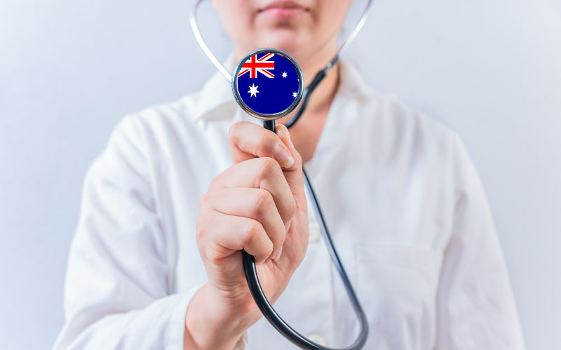 Australia National Healthcare concept. Female doctor showing stethoscope with Australia flag. Image: iStock / IherPhoto Achieving health equity in Australia