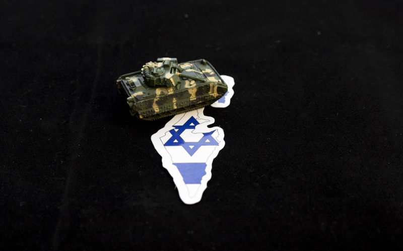 Toy tank on Israel map flag. Military symbolism and geopolitical concept. Image: iStock / Bilal photos We must confound the Zionist Lobby