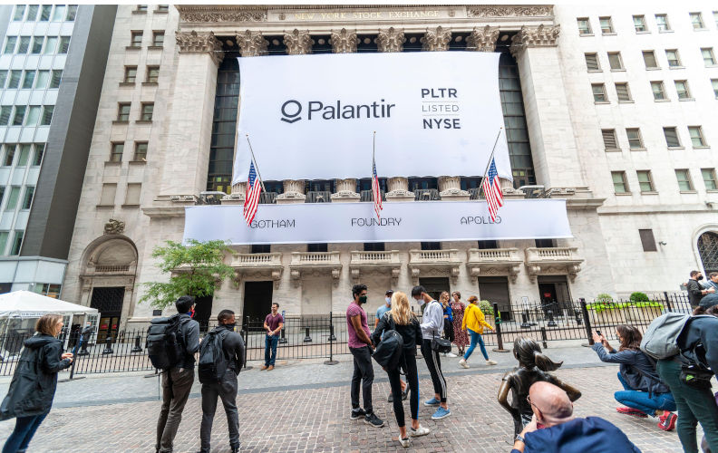 Workers from Palantir Technologies congregate outside the New York Stock Exchange decorated on Wednesday, September 30, 2020 for its initial public offering. The data company renowned for its secrecy has received financial baking from the Central Intelligence Agency and is known for work it has done for the US government. ((c) Richard B. Levine)Image: Alamy. Contributor: Richard Levine Image ID: 2CY0WA7 The future of surveillance tech is already here – in the US, not China