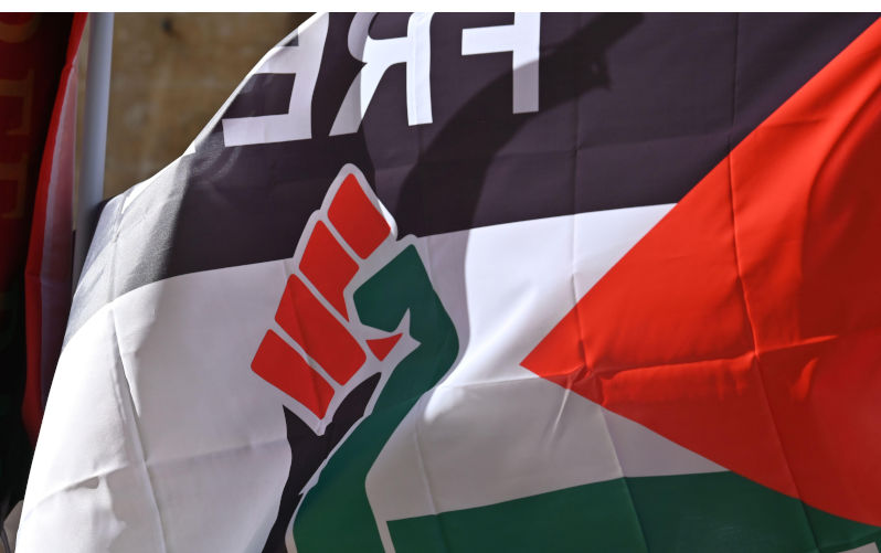 Palestinian flag with clenched fist at a demonstration against the actions of the Israeli military. Valletta, Malta - October 6, 2024: Image: Alamy Contributor: Curiositas Image ID: 2YDKWPM The time has come for a Palestinian nation