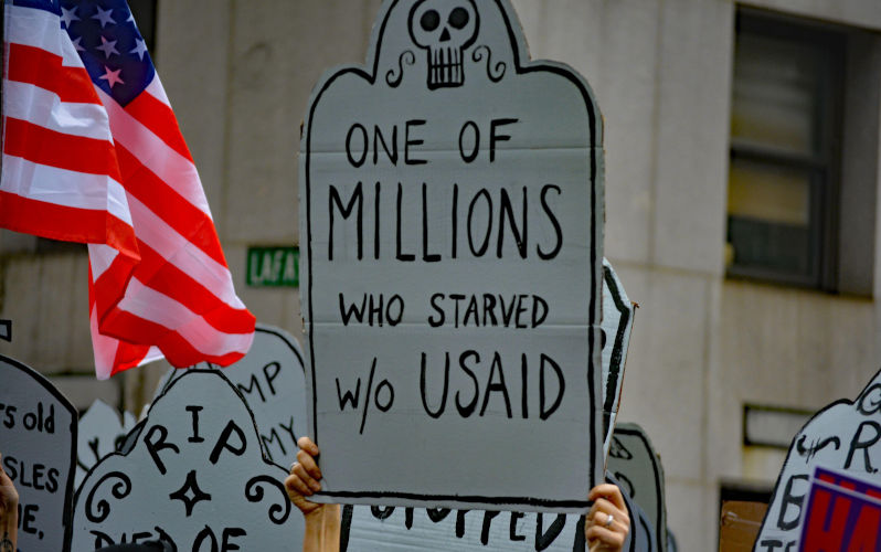 Sign supporting USAID at a Stup the Cuts rally against DOGE in Lower Manhattan. Contributor: Christopher Penler / Alamy Stock Photo Image ID: 3A3YAMG Trump’s USAID cuts only accelerate the West’s miserly convergence with China