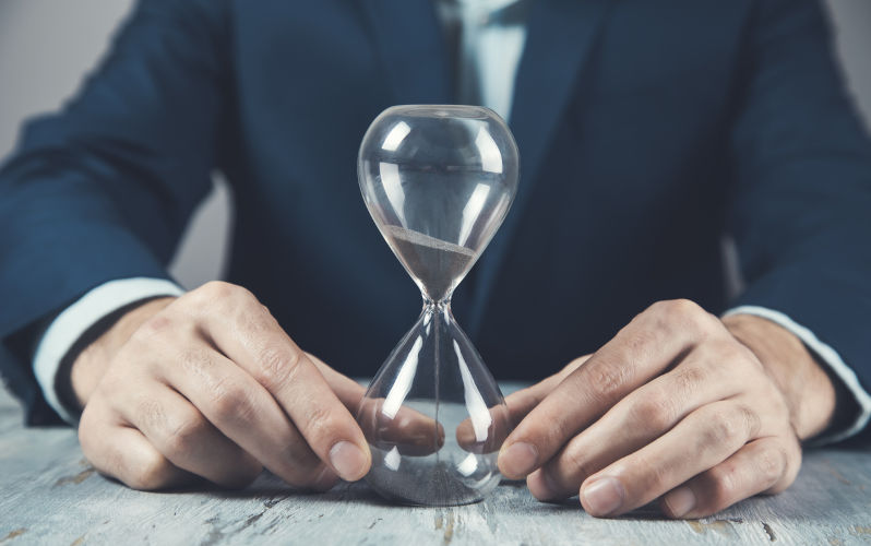Man with hourglass on table. Image: iStock / Aramyan An entirely new approach to public policy