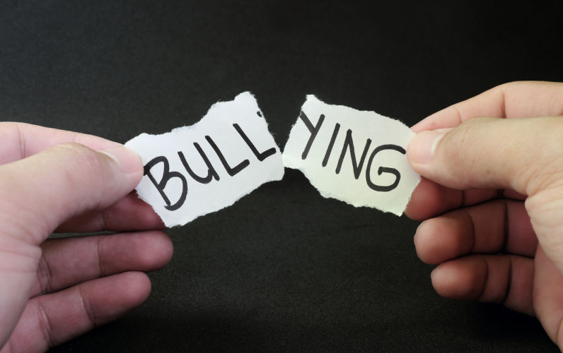 Bullying concept. Image iStock / CreditJohn Kevin Managing bullying or manufacturing shame? How neoliberal bureaucracy gets it wrong – again