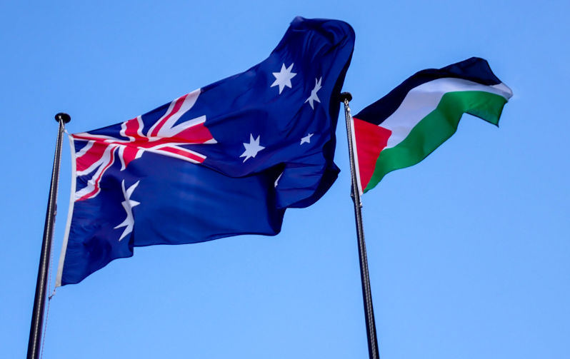 The flags of Australia and the Palestine Liberation Organisation fly on flagpoles in Paul Keating Park, Bankstown, south-west Sydney. The park is named after a former Prime Minister and Federal Member of Parliament for this area. This image was taken on a sunny afternoon on 28 October 2023. Image: iStock / SCM Jeans The sham of Australia's recognition of Palestine: Hope, but light on glory
