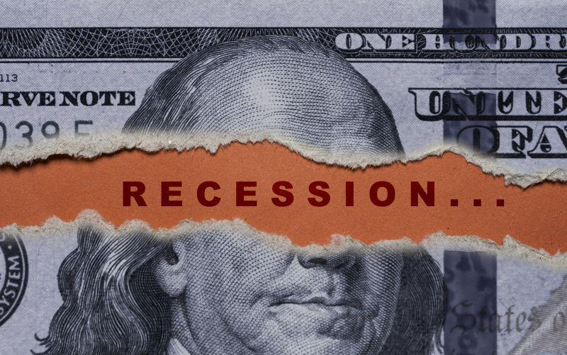USD dollar banknote is torn with recession wording on red background for United of America risk of great economic depression crisis concept. Image: iStock / Dilok Klaisataporn The recession door opens