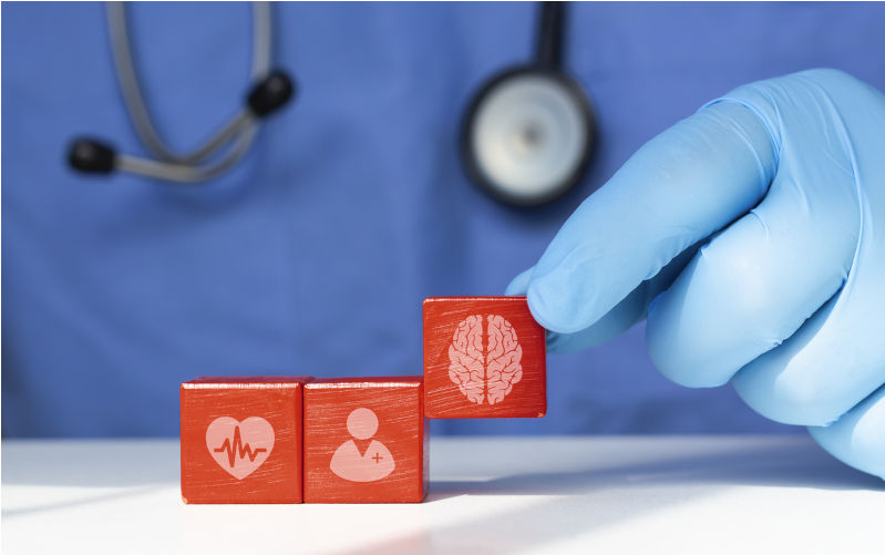 Mental health concept. Alzheimer's and seizure disorder awareness. Degenerative health treatment. Doctor places wooden cubes.Image: iStock/Marco-Marca Research misconduct: Strengthening Australia’s research integrity system