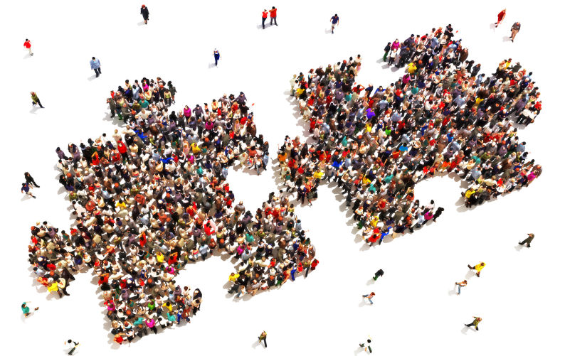 Large group of people in the shape of two puzzle pieces on a white background. Image:iStock/DigtialStorm Empathy, morality, civilisation and resisting tyrants