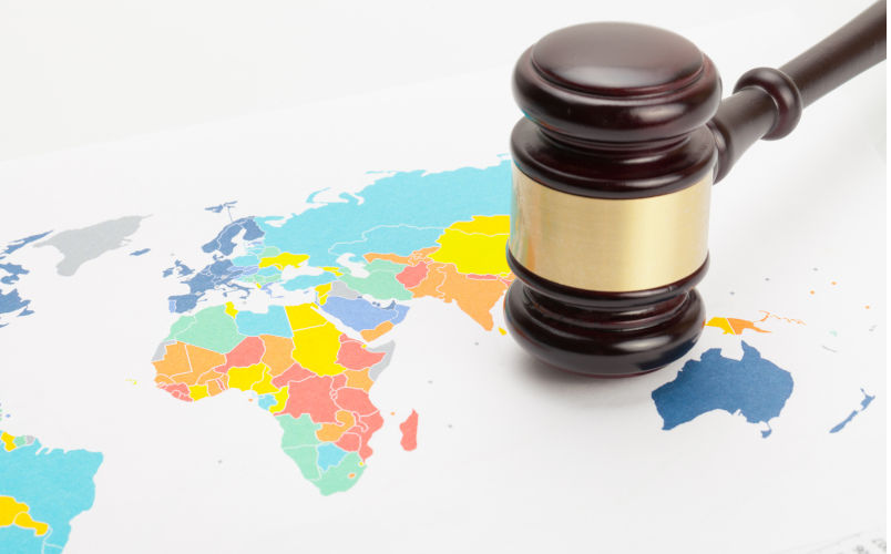 Judge's gavel over colourful world map. Image: iStock / Serhej Calka It is time to take our indifference to the Gaza horror seriously