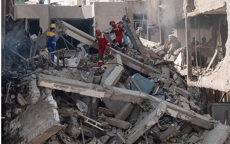 Tehran, Iran. 12th June, 2025. Iranian rescue teams search for survivors following Israeli airstrikes in Tehran, Iran, on June 14, 2025. Iran's top military generals and nuclear scientists were killed in the attacks that also targeted nuclear and military facilities, according to published reports. Photo by Rouhollah Vahdati/UPI Credit: UPI/Alamy Live News Contributor: UPI / Alamy Stock Photo Image ID: 3BJAFE7 The illegal attack on Iran