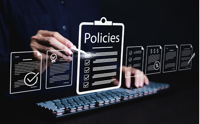 Policy documentation and compliance concept. A person reviews digital document labeled Policies with icons, checklists, certifications, and financial detail. policy management, regulatory compliance. Image: iStock / Supatman A minority Labor Government's policy agenda – Part 1