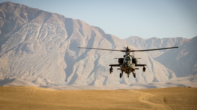 An illustrative photo of an Apache helicopter