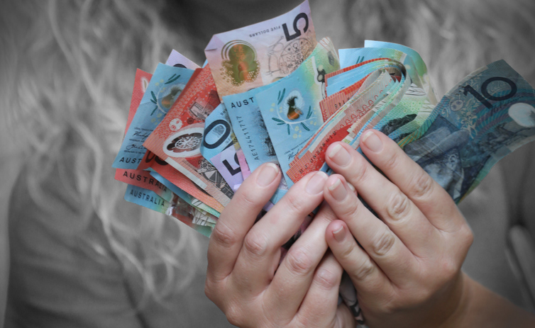 Australian currency cash held by a person