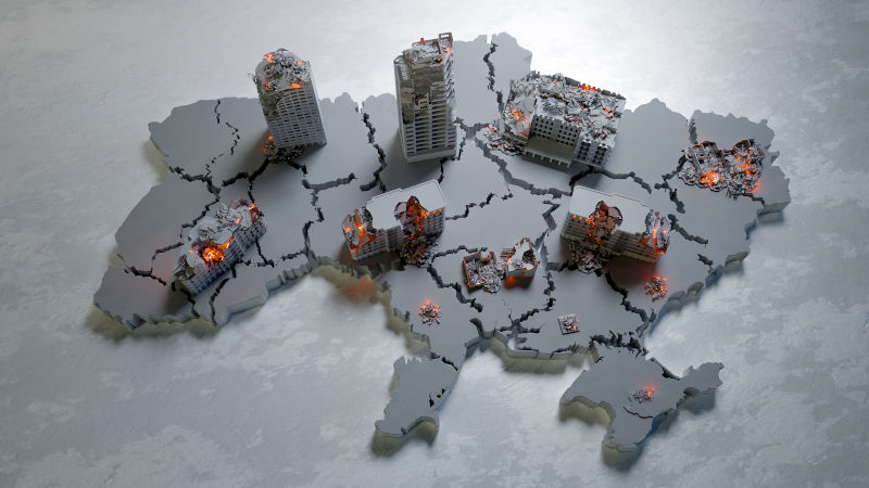 A model map of Ukraine showing bombed building in impacted regions