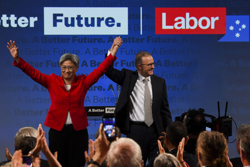 Australian PM Anthony Albanese (right) and Foreign Affairs Minister Penny Wong acknowledge the crowd of Labor supporters