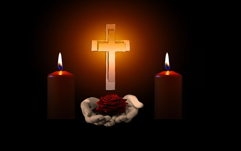 The Cross and candles of condolence