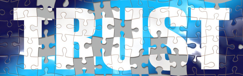 A jigsaw puzzle spells trust with missing pieces