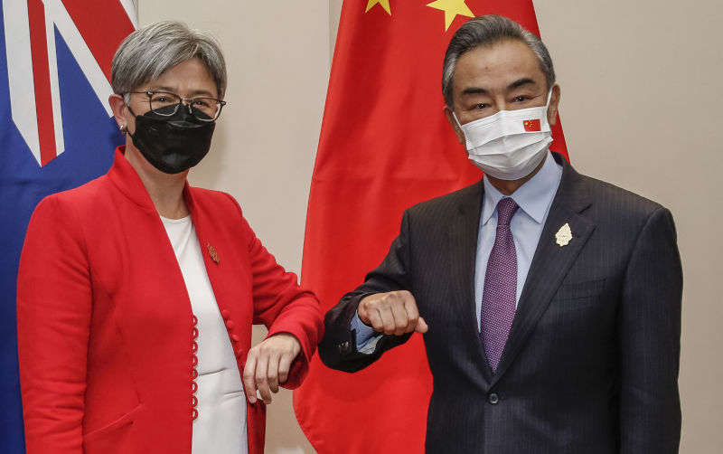 Australian Foreign Minister Penny Wong and Chinese Foreign Minister Wang at a bilateral meeting during the the G20 Foreign Ministers' Meeting at Nusa Dua in South Kuta, Bali, Indonesia, Friday, July 8, 2022.