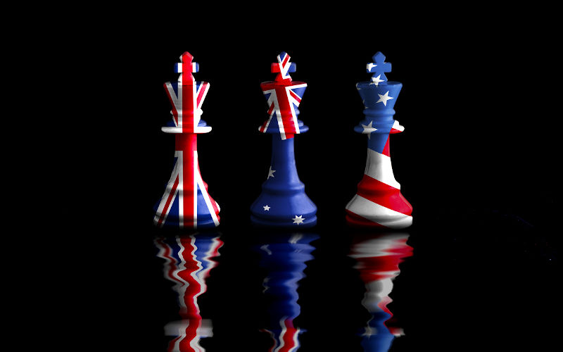 Chess pieces painted in US, UK, AUS flags