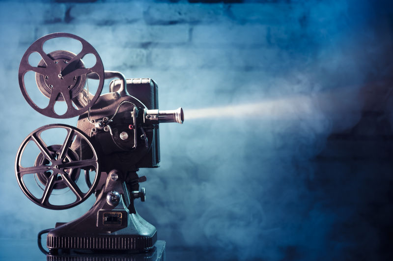 Old film projector with dramatic lighting