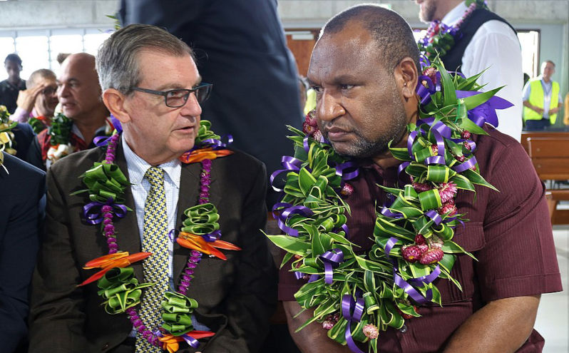 PNG Prime Minister James Marape (right) and Bruce Davis (left) on 14th June 2019