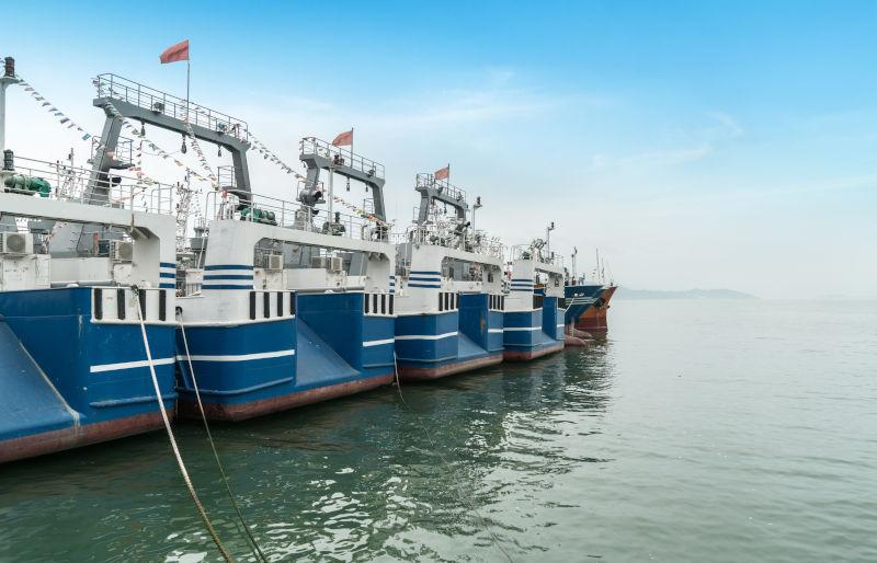 A row of large-Chinese-fishing- ships moored at the port, Shenzhen, China