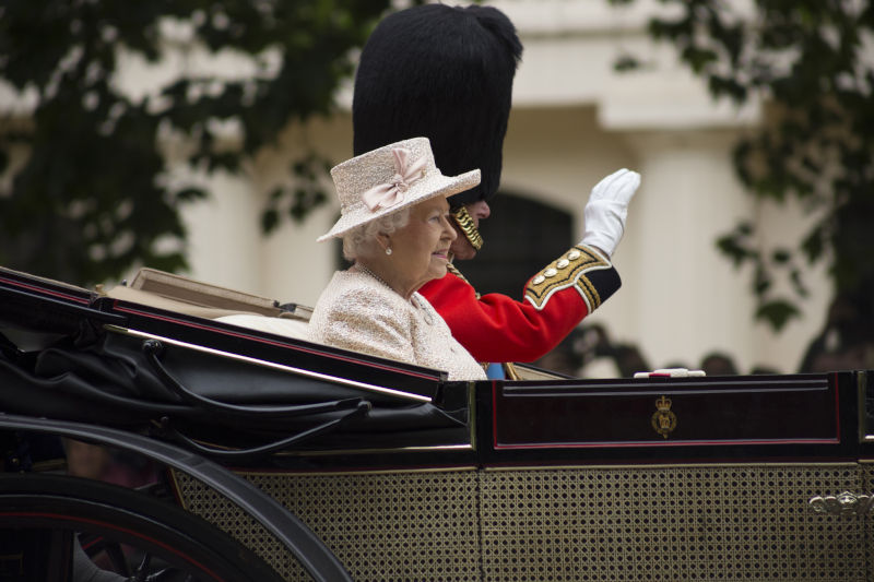 London, England - June 13, 2015: Queen Elizabeth II in an open carriage with Prince Philip for trooping the colour 2015 to mark the Queens official birthday, London, UK