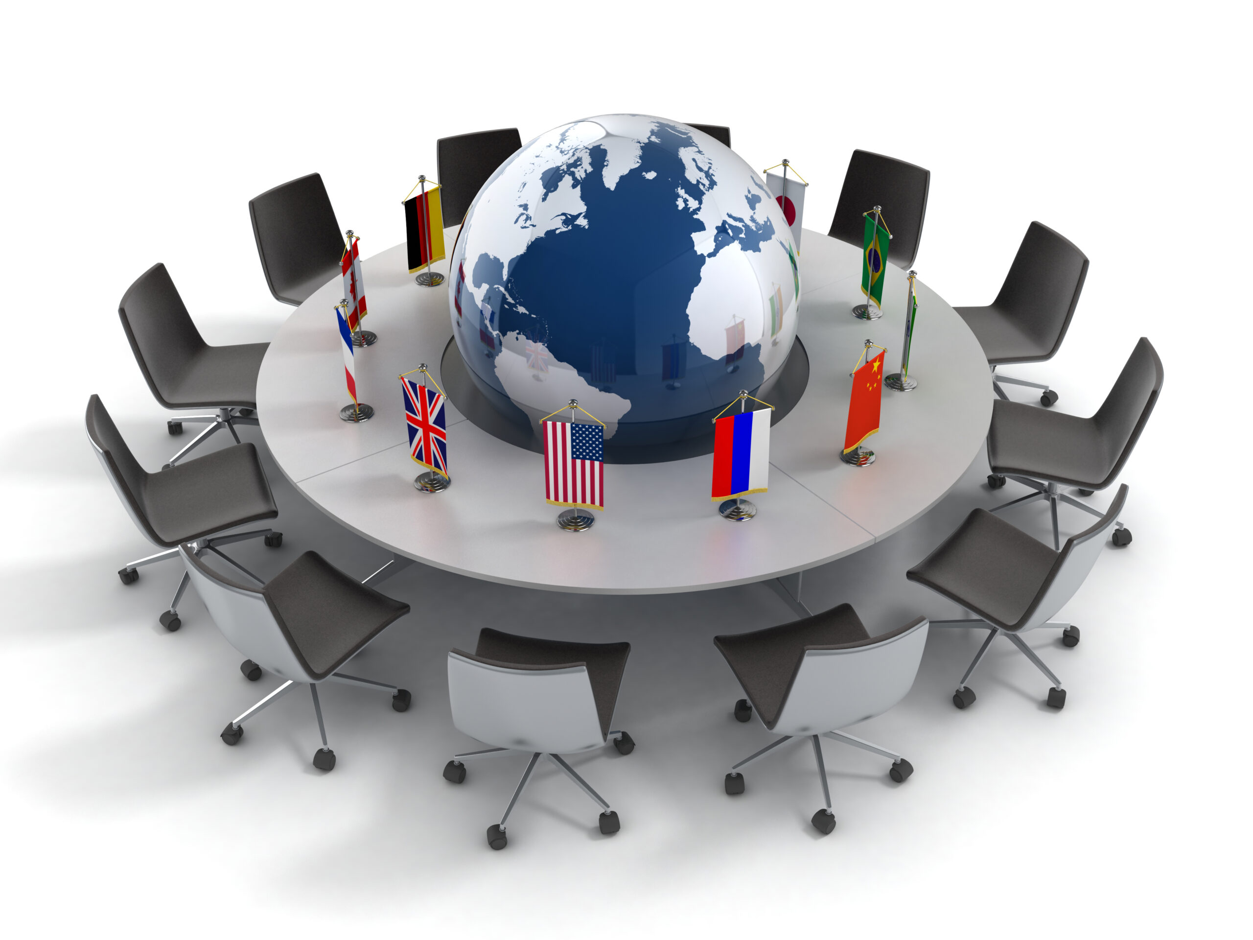 The world on the round table surrounded by flags