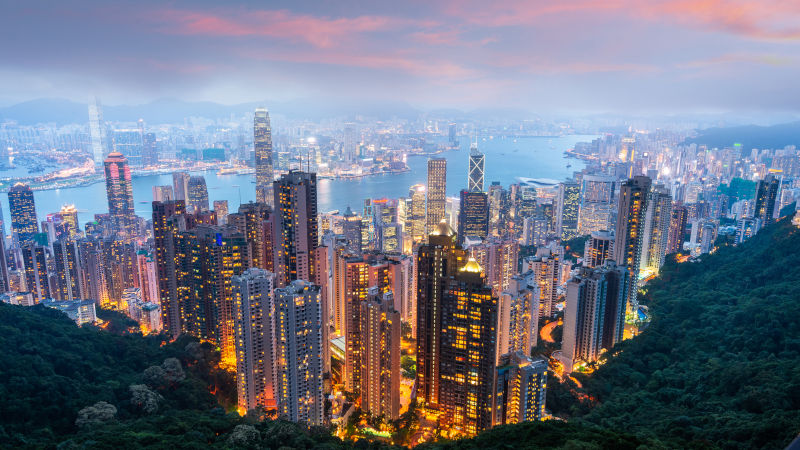 Hong Kong, China city skyline from Victoria Peak at dusk.