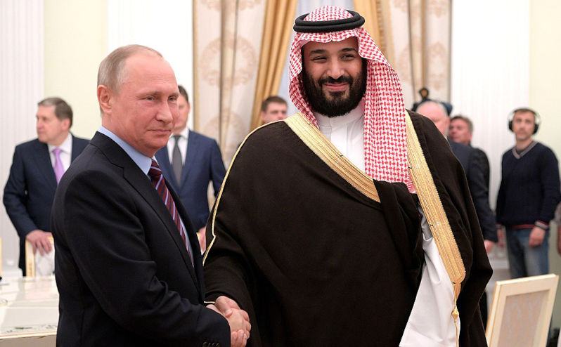 Mohammed bin Salman and Vladimir Putin shaking hands