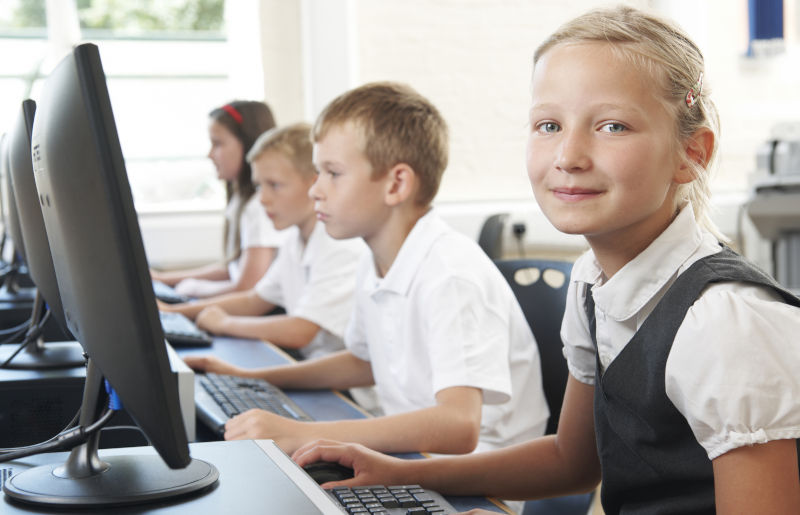 School pupils sitting at computers