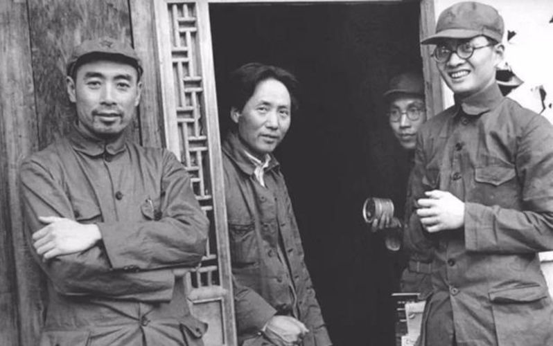 Mao Zedong (center-left), Zhou Enlai (far left) and and Bo Gu (first from right) in Yanan, 1935.