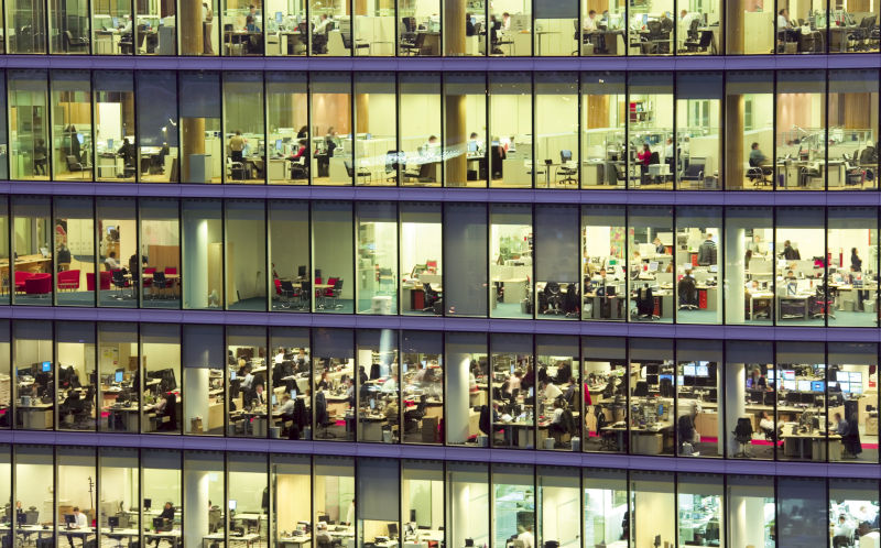 Modern office block at night.