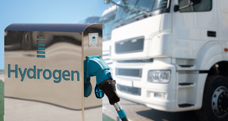 Self service hydrogen filling station on a background of trucks.