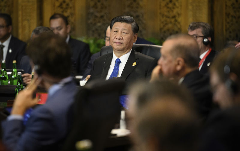 The Image Hartcher called the Face of Capitulation. In fact,Chinese President Xi Jinping attends a working session on food and energy security during the G20 Summit, Tuesday, Nov. 15, 2022, in Nusa Dua, Bali, Indonesia. Image: AAP/AP Leon Neal/Pool