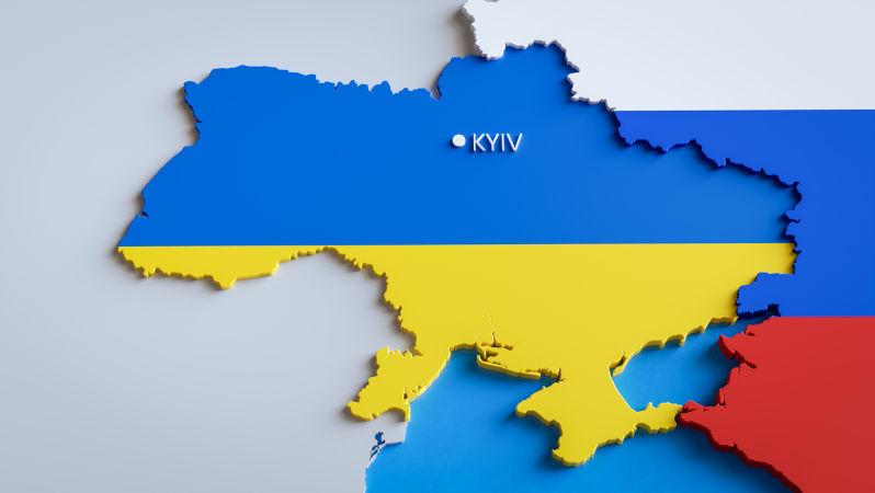 Ukraine painted in colour of national flag next to map of Russia.