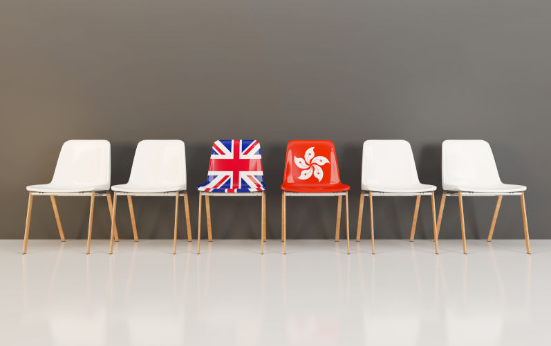 Chairs with flag of United Kingdom and hong kong in a row.